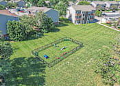 Thumbnail 14 of 16 - Lush Green Space at Whitcomb Terrace Apartments, Merrillville, IN