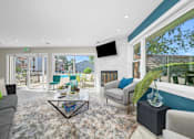 Thumbnail 5 of 16 - Living Area With Fireplace at Whitcomb Terrace Apartments, Merrillville, 46410