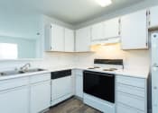 Thumbnail 8 of 13 - Kitchen at Granville Oaks Apartment Homes, Creedmoor, NC 27522