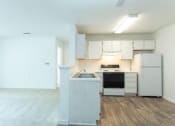 Thumbnail 9 of 13 - Kitchen Unit at Granville Oaks Apartment Homes, Creedmoor, NC 27522