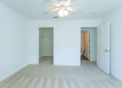 Thumbnail 11 of 13 - Carpeted Bedroom at Granville Oaks Apartment Homes, Creedmoor, NC 27522
