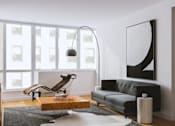 Thumbnail 6 of 11 - Living Room With Relaxing Chair at The Metropolis, New York