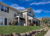 Thumbnail 11 of 13 - Front Lawn View at Luann Place Apartments, Wisconsin, 53713