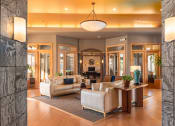 Thumbnail 12 of 49 - a living room filled with furniture and a large window