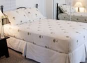 Thumbnail 23 of 46 - bed with a white comforter  at Great Northern, Missoula, 59808