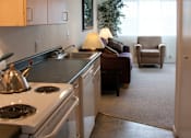 Thumbnail 18 of 46 - kitchen with a stove top oven at Great Northern, Missoula