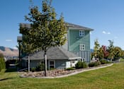 Thumbnail 9 of 46 - green house with a grey roof at Great Northern, Montana, 59808
