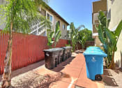 Thumbnail 5 of 31 - a row of trash cans in front of the building