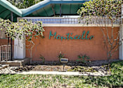 Thumbnail 2 of 30 - A Monticello sign is on a building.