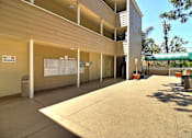 Thumbnail 14 of 30 - A building with a no smoking sign on the wall.