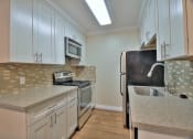 Thumbnail 19 of 51 - Modern Kitchen With Custom Cabinet at Sunnyvale Town Center, Sunnyvale, 94086