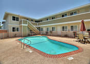 Thumbnail 7 of 21 - a resort style pool is in the middle of a building