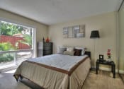 Thumbnail 14 of 80 - Bedroom with Floor to Ceiling Windows at Casa Alberta Apartments, California