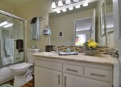 Thumbnail 16 of 80 - Bathroom With Vanity Lights at Casa Alberta Apartments, Sunnyvale, CA 94087