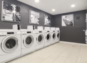 Thumbnail 15 of 22 - residents laundromat room