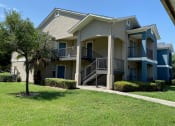 Thumbnail 3 of 13 - Lush Green Outdoors at Rosillo Creek Apartments, San Antonio, TX, 78218