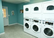 Thumbnail 14 of 22 - Left side of Laundry Room
