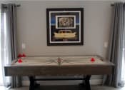 Thumbnail 6 of 22 - Park West Resident's Enjoy Air Hockey at Park West Apartments, California, 91710