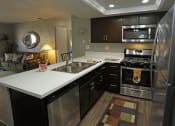 Thumbnail 1 of 22 - Fully Equipped Kitchen at Park West Apartments, Chino, CA, 91710