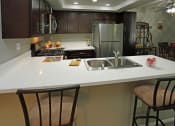 Thumbnail 14 of 22 - Gourmet Kitchens with Islands at Park West Apartments, Chino, CA, 91710