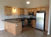 Thumbnail 7 of 13 - Spacious Kitchen at The Pines Townhomes, North Dakota, 58104