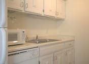 Thumbnail 11 of 18 - Renovated Apartments with Separate Kitchens:Microwaves , Dishwashers at Woodmere Townhomes, Wisconsin, 53012