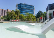 Thumbnail 14 of 25 - sparkling pool in apartments near red river district