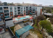 Thumbnail 18 of 25 - exterior shot of luxury austin apartments near red river district