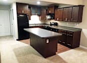 Thumbnail 10 of 23 - Gourmet kitchen at Alpine Slopes Apartments near Grand Rapids, MI