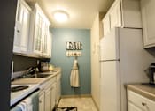 Thumbnail 7 of 19 - Gourmet kitchen at Mason Hills Apartments in Mason, MI
