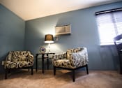 Thumbnail 10 of 19 - Sitting room at Mason Hills Apartments in Mason, MI