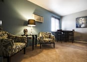 Thumbnail 11 of 19 - Living room at Mason Hills Apartments in Mason, MI
