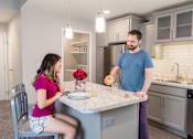 Thumbnail 1 of 29 - Updated Kitchen Pine Lane Estates Apartments in Lansing near Eastwood Towne Center