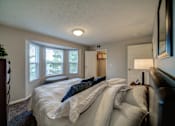 Thumbnail 16 of 29 - Spacious bedroom in Lansing Apartments with bay window