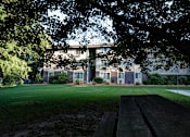 Thumbnail 17 of 18 - Exterior at Sycamore Apartments in Holt, MI