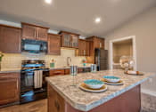 Thumbnail 3 of 26 - Gourmet kitchen at Verndale Apartments in Lansing, MI 