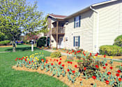 Thumbnail 1 of 18 - Exterior of Whispering Pines Apartments in Holland, Michigan