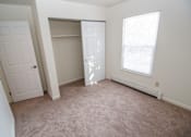 Thumbnail 14 of 18 - Bedroom at Whispering Pines Apartments in Holland, Michigan