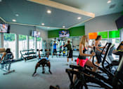 Thumbnail 16 of 24 - Fitness center at Abbott Pointe Apartments in East Lansing, MI near Michigan State University