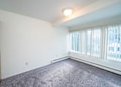 Thumbnail 5 of 8 - Spacious Living room in East Lansing Apartments near Michigan State University | Americana Apartments
