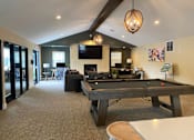 Thumbnail 8 of 20 - Clubhouse at Arbor Glen Apartments in East Lansing, MI near Michigan State University.