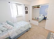 Thumbnail 13 of 20 - Spacious bedrooms in East Lansing Apartments near Michigan State University | Burnt Tree