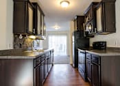 Thumbnail 4 of 22 - Spacious Kitchen in East Lansing Apartments near Michigan State University | Carriage Hill East