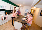 Thumbnail 1 of 13 - Spacious Kitchen and Living room in East Lansing Apartments near Michigan State University | Cedar Greens