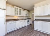 Thumbnail 6 of 11 - Spacious Kitchen in East Lansing Apartments near Michigan State University | DTN Houses