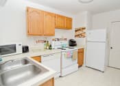 Thumbnail 9 of 11 - Spacious Kitchen in East Lansing Apartments near Michigan State University | DTN Houses