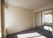 Thumbnail 5 of 10 - Spacious bedrooms in East Lansing Apartments near Michigan State University | Eden Roc
