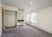 Thumbnail 6 of 10 - Spacious bedrooms in East Lansing Apartments near Michigan State University | Eden Roc