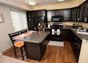 Thumbnail 11 of 26 - Spacious Kitchen in East Lansing Apartments near Michigan State University | Glenwood