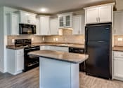 Thumbnail 12 of 26 - Spacious Kitchen in East Lansing Apartments near Michigan State University | Glenwood